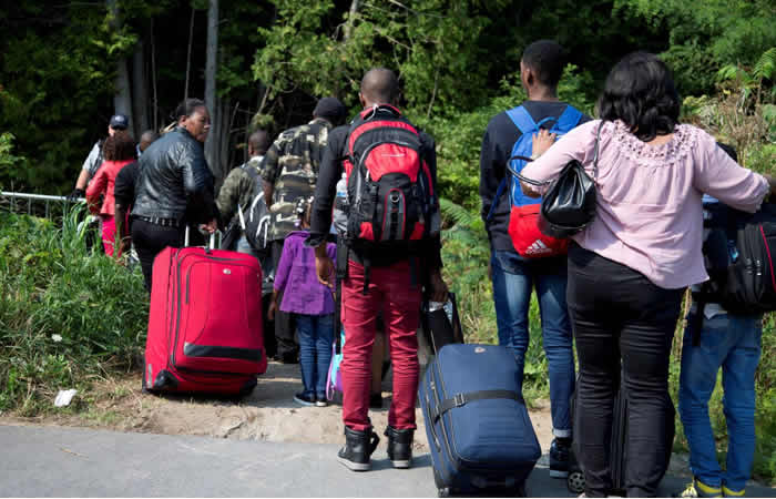 , 201805Immigrants at US Canadian border