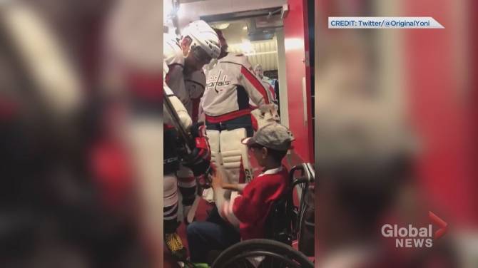 Click to play video: Alexander Ovechkin gives hockey stick to young fan in wheelchair following game in Calgary