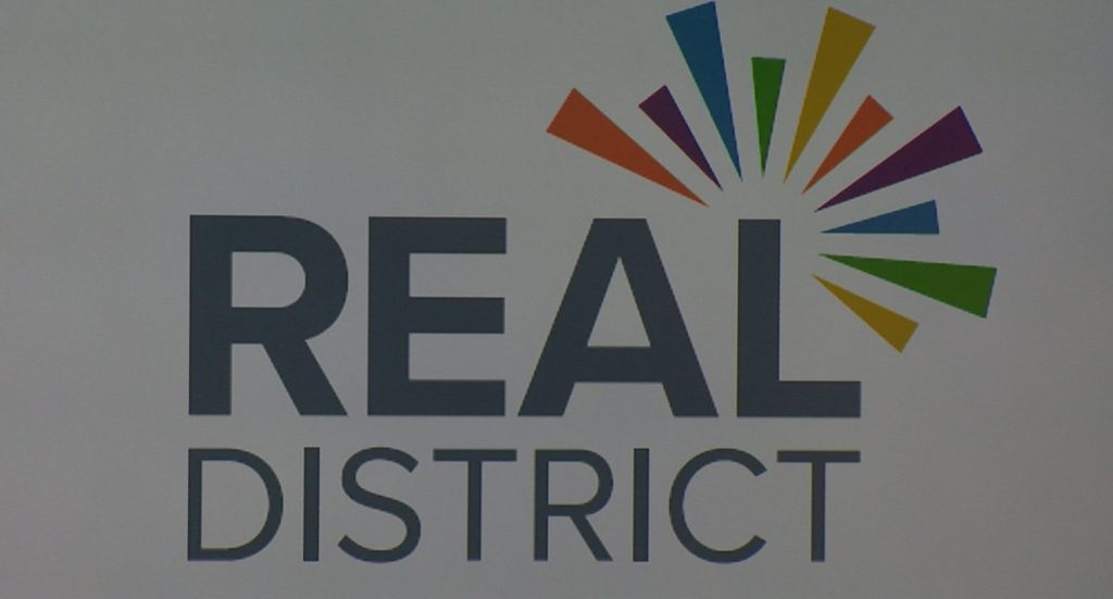 , 202203REAL District Logo e1646253936488