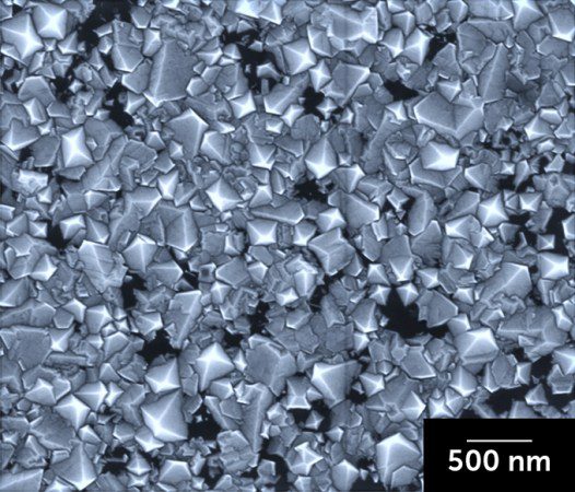 A sheet of diamonds made in a laboratory with a scale bar reading "500 nm."